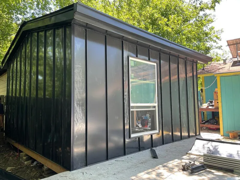 Black standing seam metal wall panels for Roof Inspection in West Orange