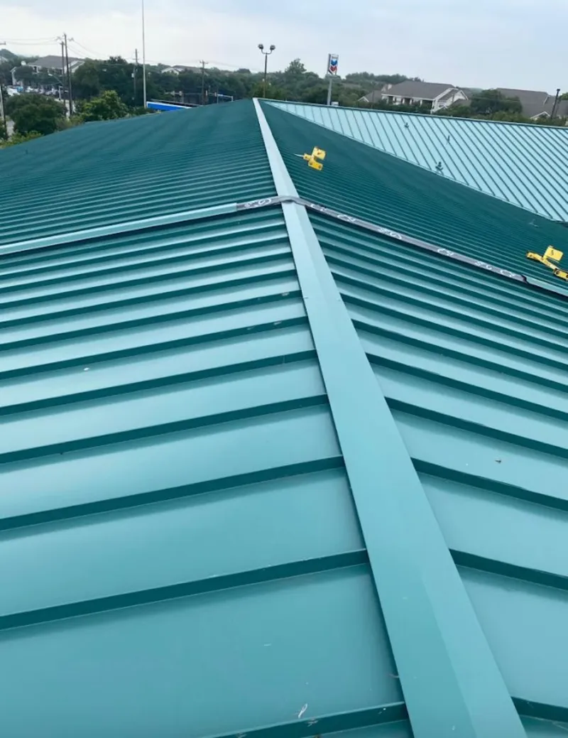 Green commercial metal roof ridge and valley for Metal Roof Repair in West Orange